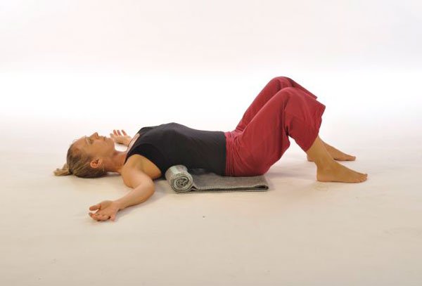 Upper back over rolled blanket