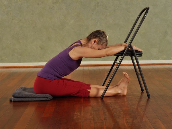Supported Paschimottanasana – Seated Forward Bend