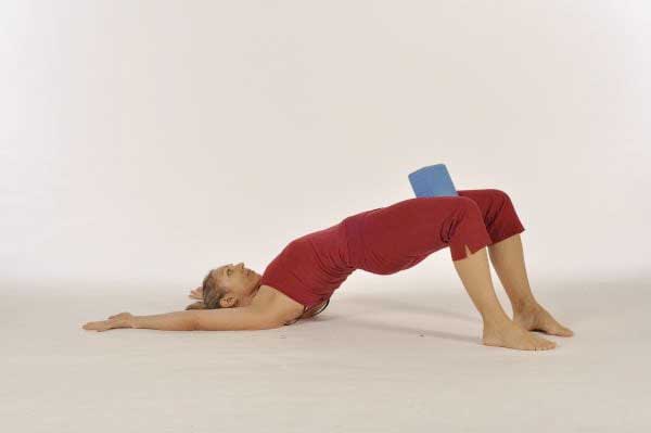 Supported Fish Pose on Yoga Block with Eagle Legs and Eagle Arms in Supine  Hollow Back — I am struggling to push my buttock to the ground while  keeping... | By Inspiring YogaFacebook